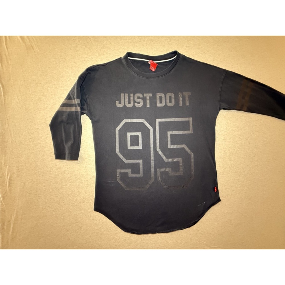 Nike. Kid size Medium. Baseball style shirt. Just do it. #95